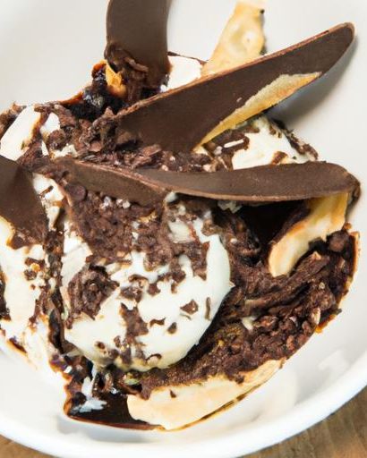 Make Delicious Authentic Stracciatella Gelato! Smooth, creamy Italian ice cream speckled with crunchy chocolate shards. A classic treat. Get the recipe!