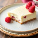 حلوى زبدية: زين الليمون والتوت الأزرق على قاعدة بسكويت زبدية كريمية، Perfect Zesty Lemon Raspberry Cheesecake