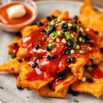 Gochujang sweet potato nachos recipe: spicy, sweet, and delicious.