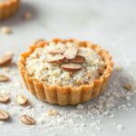 Perfect crumbly almond tart delight, close-up.
