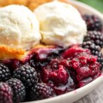 Delicious old-fashioned blackberry cobbler dessert close-up.