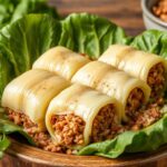 Delicious old-fashioned stuffed cabbage rolls with ground beef recipe.