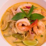 Tropical Twist: Green Curry Ramen with Coconut Shrimp Delight