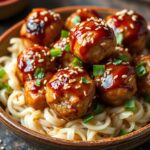 Savory Quick Asian BBQ chicken meatballs with sesame glaze.