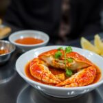 Singapore Chili crab, a spicy seafood delight.