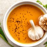 Unlock bold flavors: Homemade Sichuan chili oil with crispy garlic.