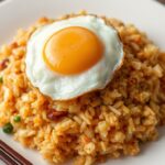 Savory fried rice topped with a perfectly fried egg.