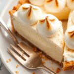 Decadent coconut custard pie with toasted meringue topping.