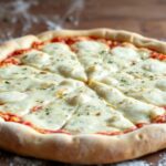 Master art of homemade pizza dough: easy, foolproof recipe.