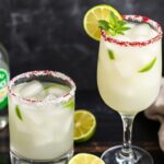 Crafting perfect coconut lime mojito mocktail, tropical twist.